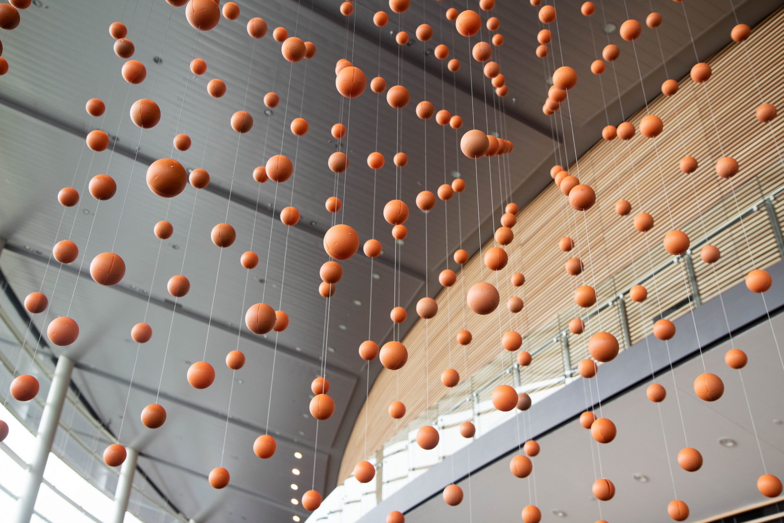 Orange spheres suspended in space